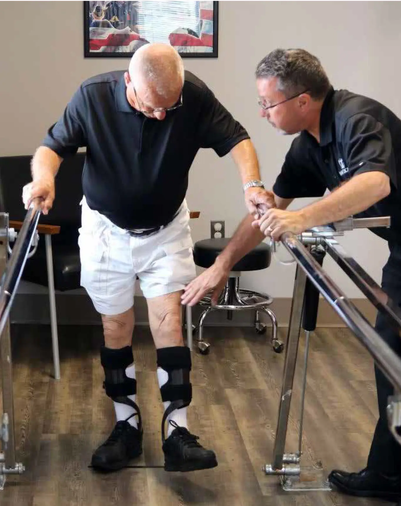 photo of a Clinical Assistant helping a man with rehabilitation